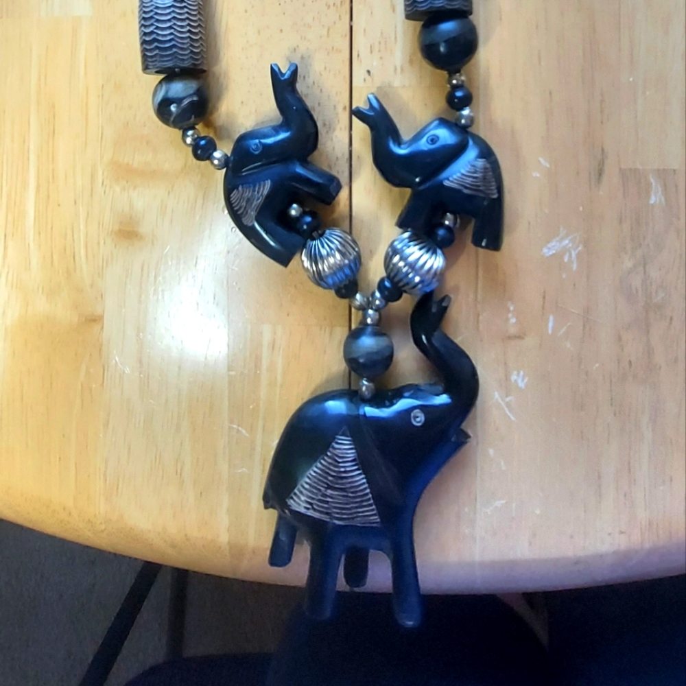 Hand carved elephant necklace